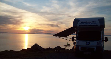 Motorhome parked and a sunset view 