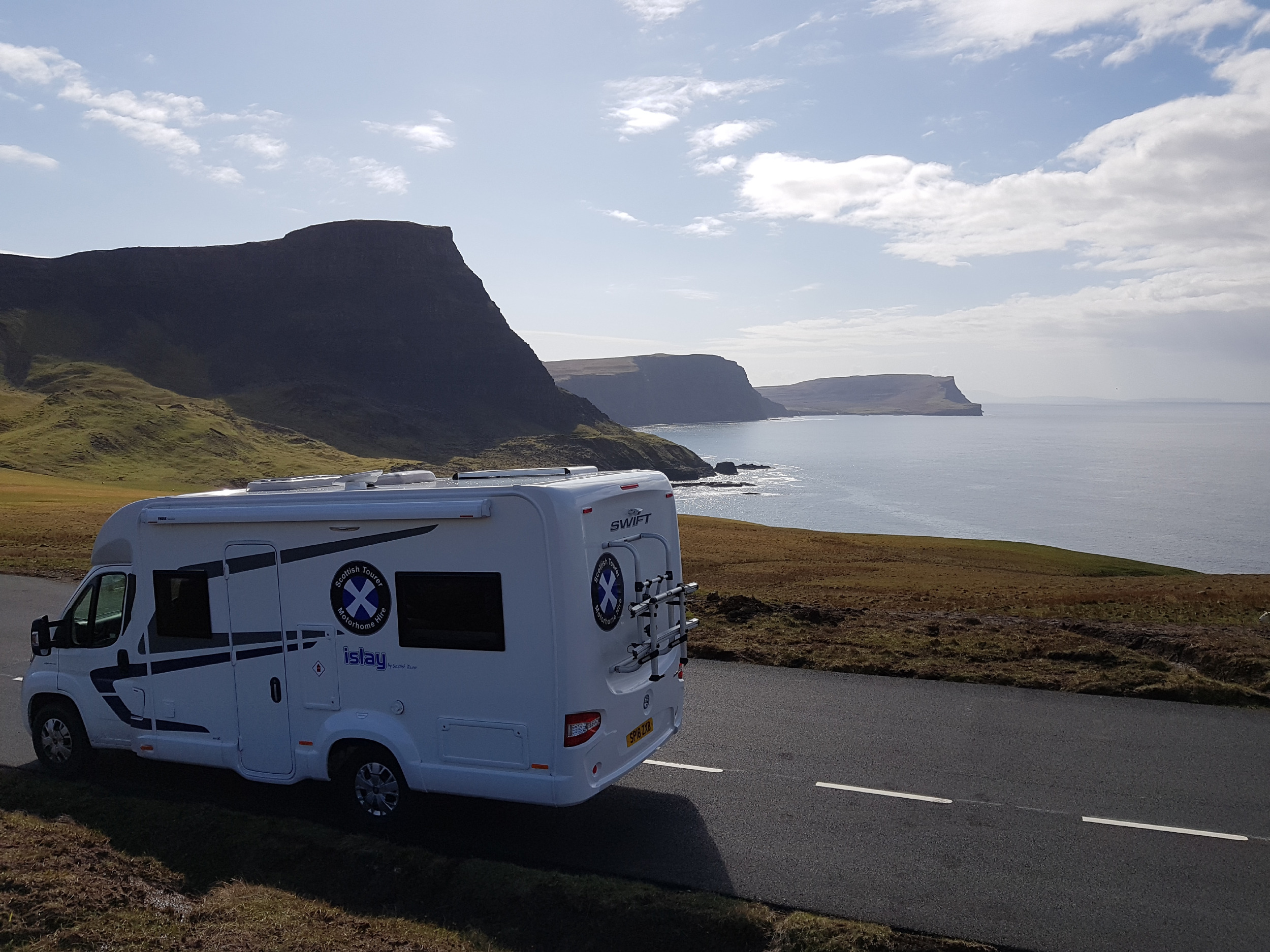 Motorhome parked by loch side